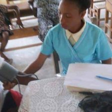 Newly Hired Nurse Monitoring Blood Pressure